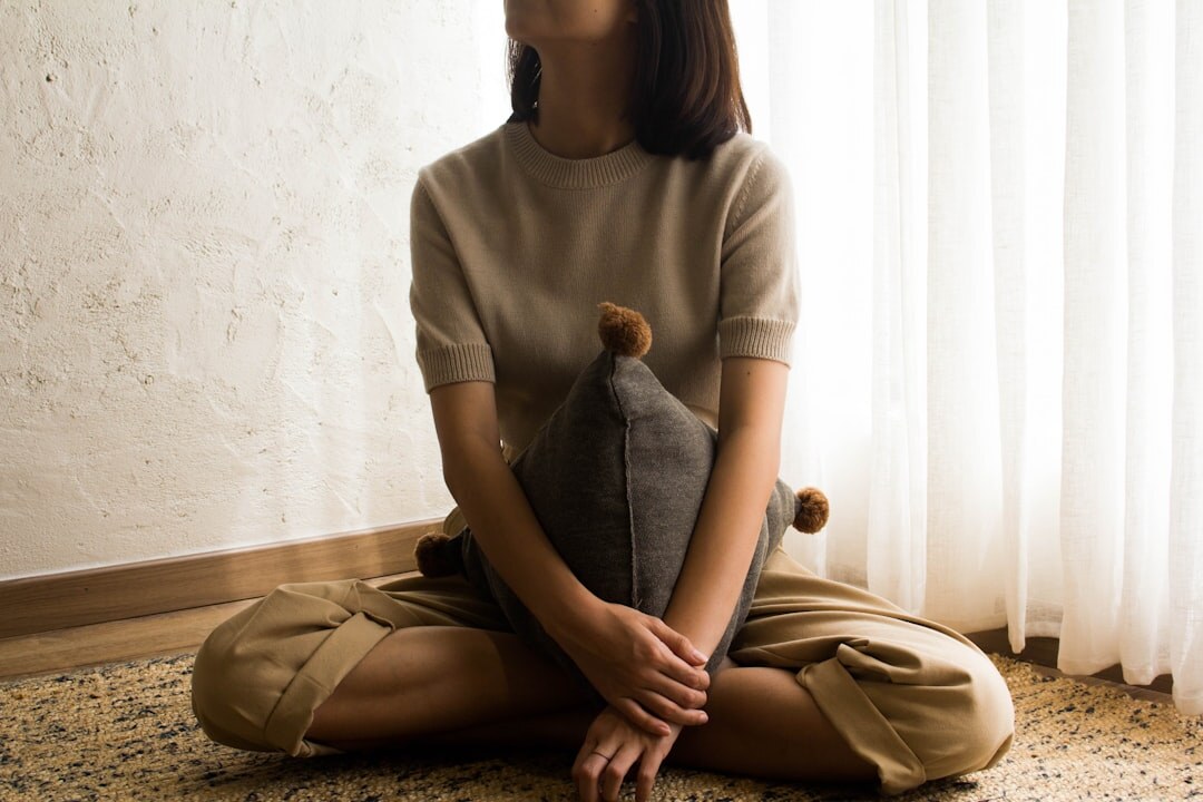 person meditating at home